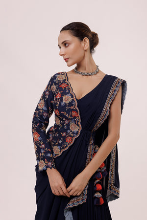 Shop beautiful navy blue drape saree online in USA with embroidered faux jacket. Look your best at parties and weddings in beautiful designer sarees, embroidered sarees, handwoven sarees, silk sarees, organza saris from Pure Elegance Indian saree store in USA.-closeup