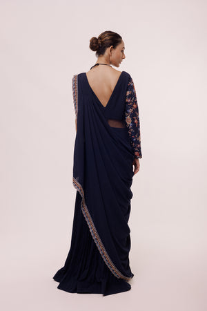 Shop beautiful navy blue drape saree online in USA with embroidered faux jacket. Look your best at parties and weddings in beautiful designer sarees, embroidered sarees, handwoven sarees, silk sarees, organza saris from Pure Elegance Indian saree store in USA.-side
