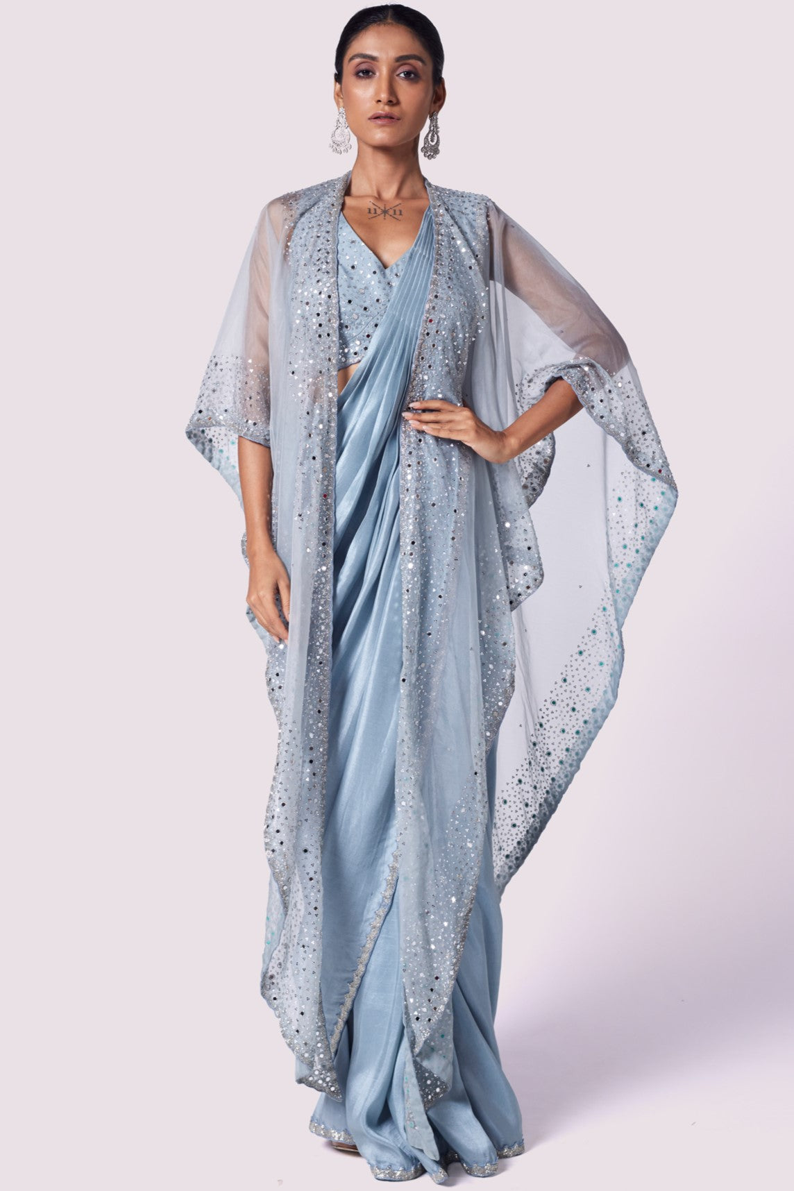 Shop stunning doctor blue lycra drape saree online in USA with cape. Look your best at parties and weddings in beautiful designer sarees, embroidered sarees, handwoven sarees, silk sarees, organza saris from Pure Elegance Indian saree store in USA.-full view