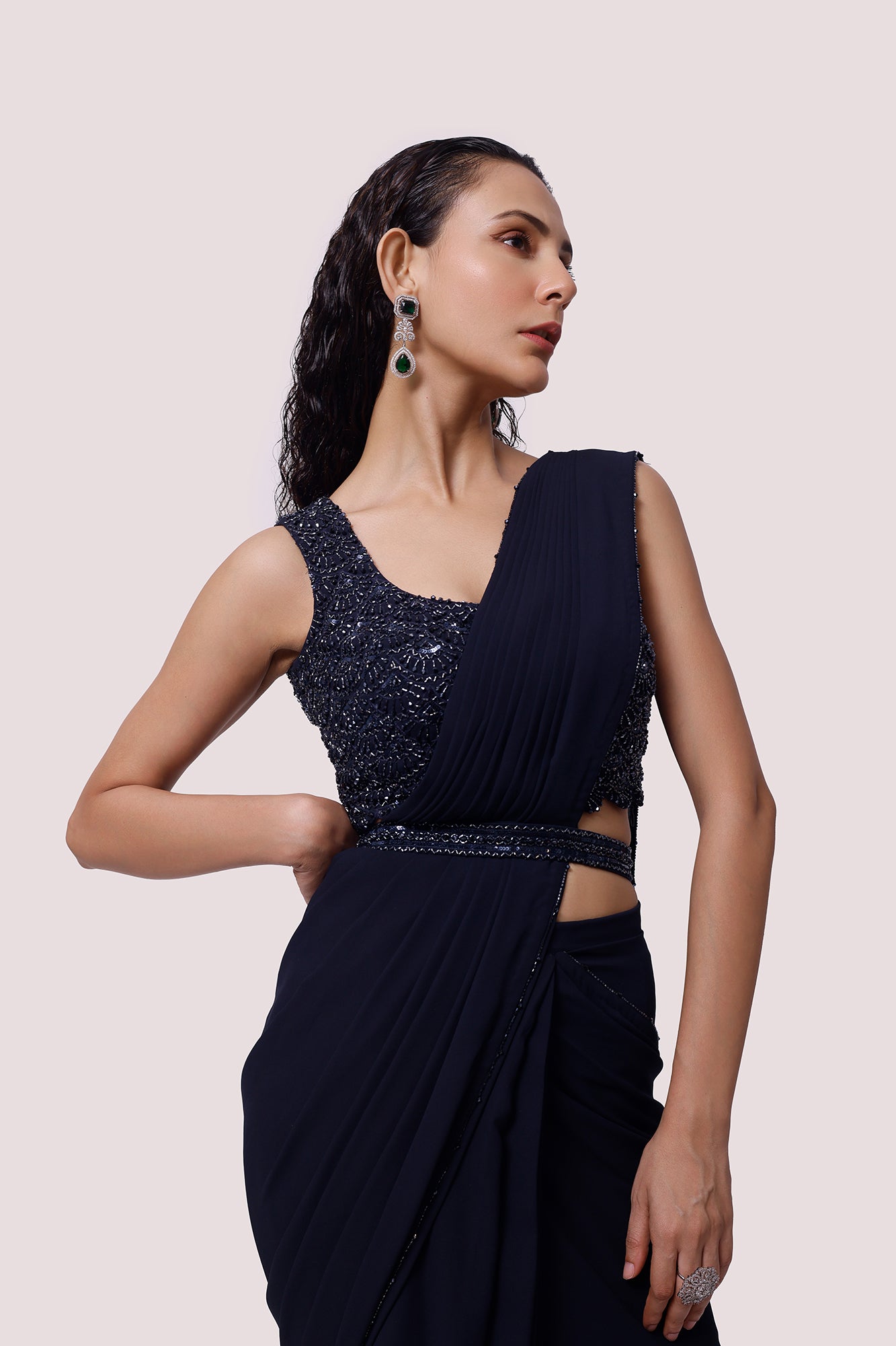 Buy navy blue embellished georgette saree online in USA with belt. Look your best at parties and weddings in beautiful designer sarees, embroidered sarees, handwoven sarees, silk sarees, organza saris from Pure Elegance Indian saree store in USA.-closeup