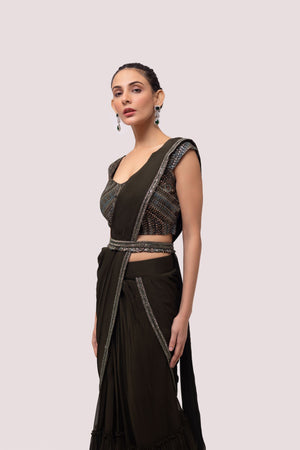 Shop olive green soft ruffle georgette saree online in USA with belt. Look your best at parties and weddings in beautiful designer sarees, embroidered sarees, handwoven sarees, silk sarees, organza saris from Pure Elegance Indian saree store in USA.-closeup