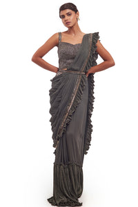 Shop beautiful drape green ruffle georgette lycra saree online in USA with belt. Look your best at parties and weddings in beautiful designer sarees, embroidered sarees, handwoven sarees, silk sarees, organza saris from Pure Elegance Indian saree store in USA.-full view