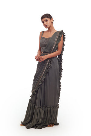 Shop beautiful drape green ruffle georgette lycra saree online in USA with belt. Look your best at parties and weddings in beautiful designer sarees, embroidered sarees, handwoven sarees, silk sarees, organza saris from Pure Elegance Indian saree store in USA.-saree
