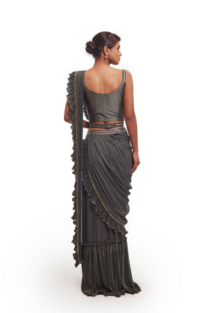 Shop beautiful drape green ruffle georgette lycra saree online in USA with belt. Look your best at parties and weddings in beautiful designer sarees, embroidered sarees, handwoven sarees, silk sarees, organza saris from Pure Elegance Indian saree store in USA.-back