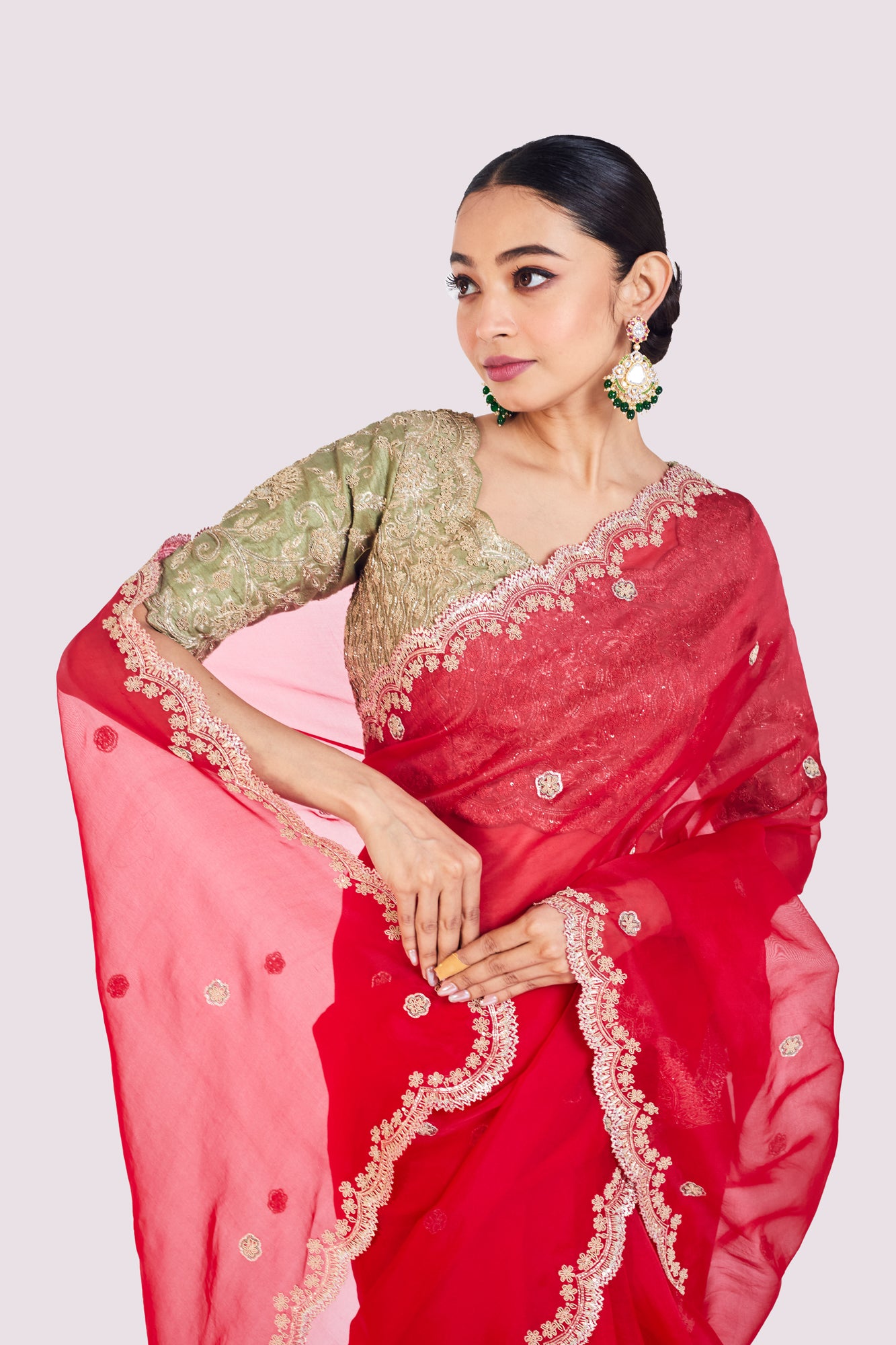 Buy red embroidered organza saree online in USA with green raw silk blouse. Look your best at parties and weddings in beautiful designer sarees, embroidered sarees, handwoven sarees, silk sarees, organza saris from Pure Elegance Indian saree store in USA.-closeup