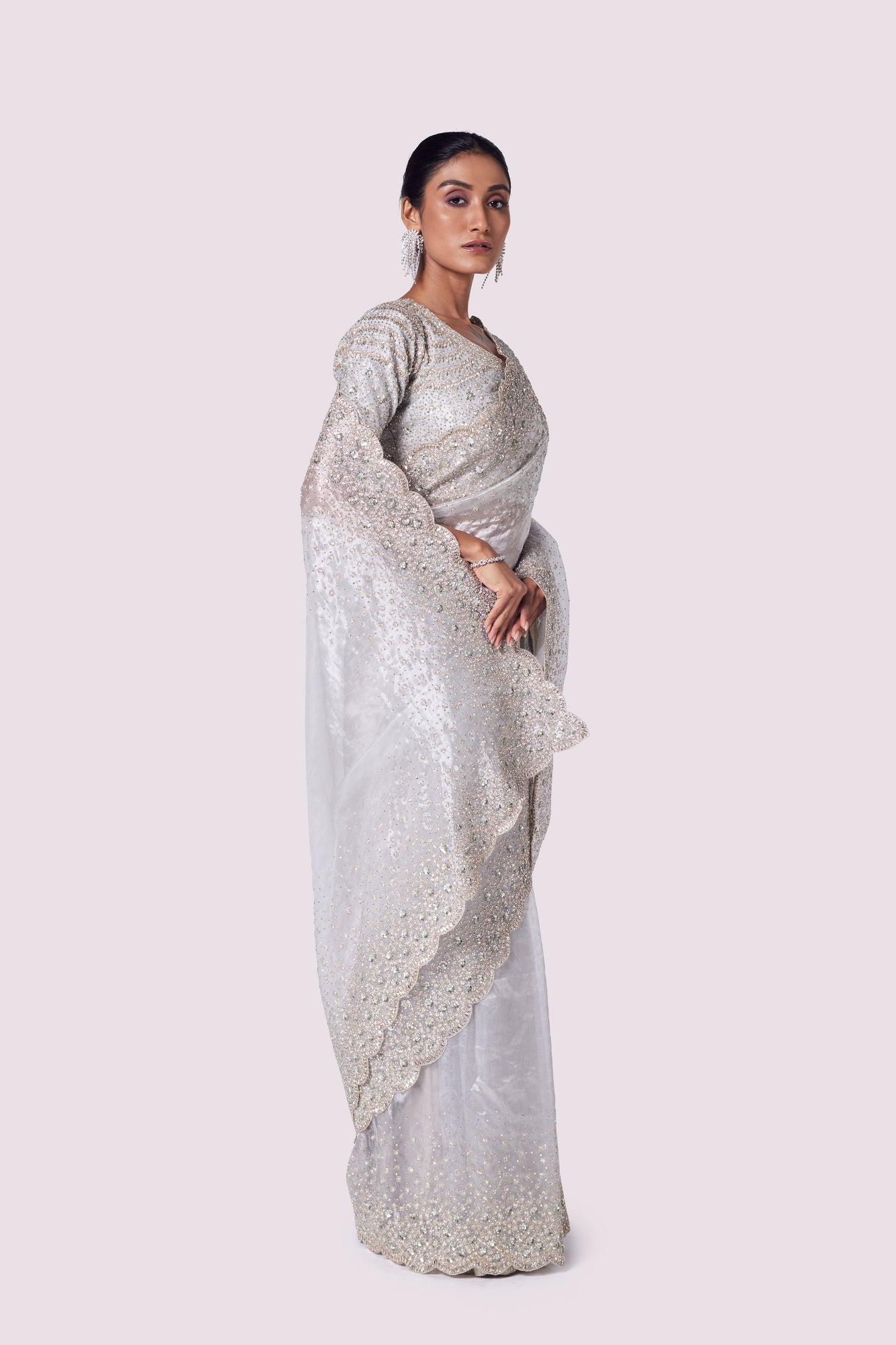 Shop beautiful steel grey embroidered tissue saree online in USA with blouse. Look your best at parties and weddings in beautiful designer sarees, embroidered sarees, handwoven sarees, silk sarees, organza saris from Pure Elegance Indian saree store in USA.-side