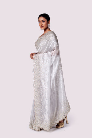 Shop beautiful steel grey embroidered tissue saree online in USA with blouse. Look your best at parties and weddings in beautiful designer sarees, embroidered sarees, handwoven sarees, silk sarees, organza saris from Pure Elegance Indian saree store in USA.-pallu