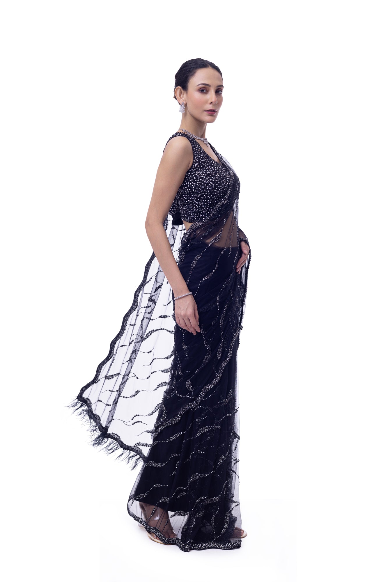 Buy black embroidered net saree online in USA with blouse. Look your best at parties and weddings in beautiful designer sarees, embroidered sarees, handwoven sarees, silk sarees, organza saris from Pure Elegance Indian saree store in USA.-side