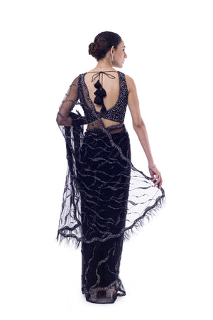 Buy black embroidered net saree online in USA with blouse. Look your best at parties and weddings in beautiful designer sarees, embroidered sarees, handwoven sarees, silk sarees, organza saris from Pure Elegance Indian saree store in USA.-back