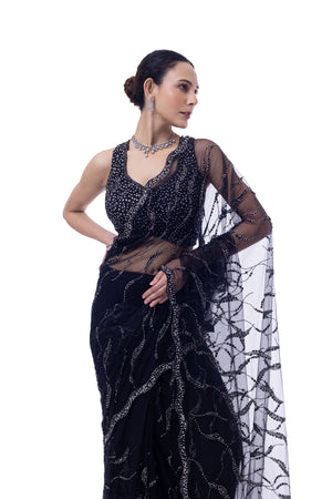 Buy black embroidered net saree online in USA with blouse. Look your best at parties and weddings in beautiful designer sarees, embroidered sarees, handwoven sarees, silk sarees, organza saris from Pure Elegance Indian saree store in USA.-closeup