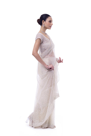 Shop off-white embroidered net saree online in USA with blouse. Look your best at parties and weddings in beautiful designer sarees, embroidered sarees, handwoven sarees, silk sarees, organza saris from Pure Elegance Indian saree store in USA.-side