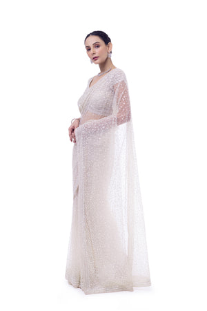 Shop off-white embroidered net saree online in USA with blouse. Look your best at parties and weddings in beautiful designer sarees, embroidered sarees, handwoven sarees, silk sarees, organza saris from Pure Elegance Indian saree store in USA.-pallu