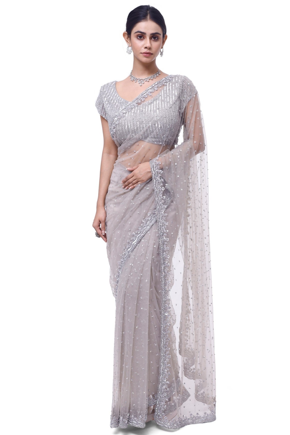 Shop beautiful light grey embroidered net saree online in USA with blouse. Look your best at parties and weddings in beautiful designer sarees, embroidered sarees, handwoven sarees, silk sarees, organza saris from Pure Elegance Indian saree store in USA.-full view