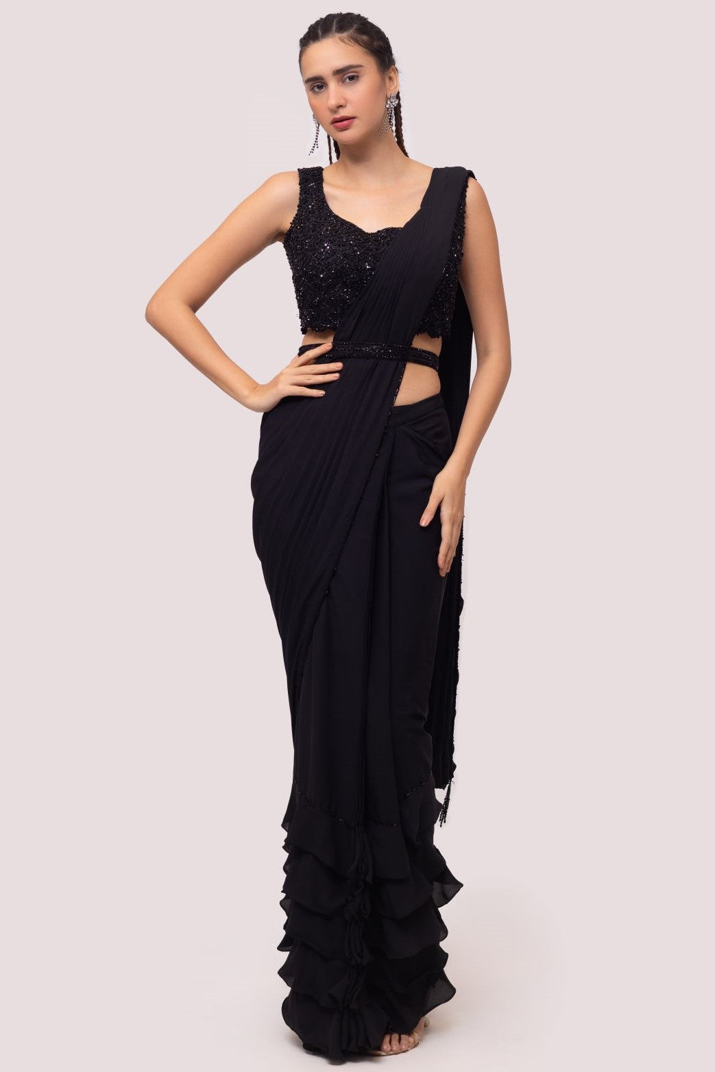 Shop black pre-draped georgette saree online in USA with soft ruffles. Look your best at parties and weddings in beautiful designer sarees, embroidered sarees, handwoven sarees, silk sarees, organza saris from Pure Elegance Indian saree store in USA.-full view