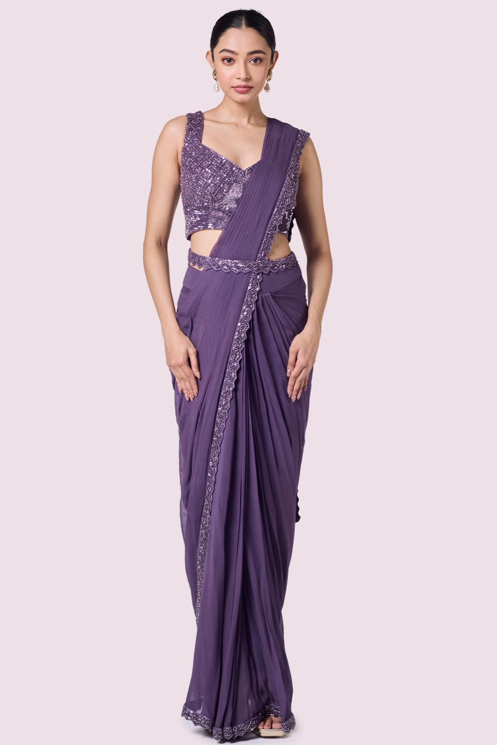 Buy lavender georgette pre-stitched saree online in USA with bustier blouse. Look your best at parties and weddings in beautiful designer sarees, embroidered sarees, handwoven sarees, silk sarees, organza saris from Pure Elegance Indian saree store in USA.-full view