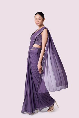 Buy lavender georgette pre-stitched saree online in USA with bustier blouse. Look your best at parties and weddings in beautiful designer sarees, embroidered sarees, handwoven sarees, silk sarees, organza saris from Pure Elegance Indian saree store in USA.-saree