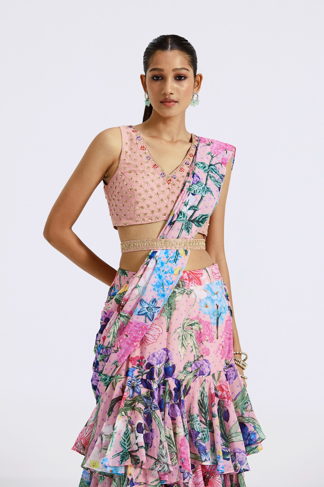 Buy pink floral print pre-draped saree online in USA with blouse. Look your best at parties and weddings in beautiful designer sarees, embroidered sarees, handwoven sarees, silk sarees, organza saris from Pure Elegance Indian saree store in USA.-closeup