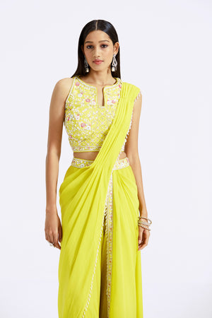 Shop yellow draped sharara saree online in USA with embroidered blouse. Look your best at parties and weddings in beautiful designer sarees, embroidered sarees, handwoven sarees, silk sarees, organza saris from Pure Elegance Indian saree store in USA.-closeup