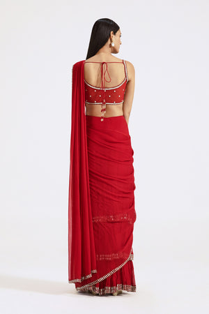 Buy red mirror work georgette pre-draped saree online in USA with embroidered blouse. Look your best at parties and weddings in beautiful designer sarees, embroidered sarees, handwoven sarees, silk sarees, organza saris from Pure Elegance Indian saree store in USA.-back