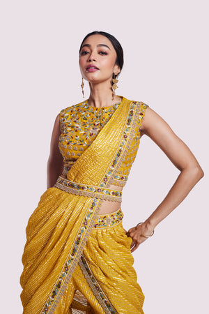 Buy mustard georgette draped saree online in USA with bustier blouse. Look your best at parties and weddings in beautiful designer sarees, embroidered sarees, handwoven sarees, silk sarees, organza saris from Pure Elegance Indian saree store in USA.-closeup