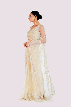 Shop beautiful ivory embroidered net saree online in USA with saree blouse. Look your best at parties and weddings in beautiful designer sarees, embroidered sarees, handwoven sarees, silk sarees, organza saris from Pure Elegance Indian saree store in USA.-pallu