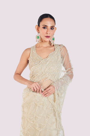 Shop beautiful ivory embroidered net saree online in USA with saree blouse. Look your best at parties and weddings in beautiful designer sarees, embroidered sarees, handwoven sarees, silk sarees, organza saris from Pure Elegance Indian saree store in USA.-closeup
