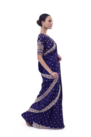 Buy purple heavy embroidered Banarasi silk saree online in USA with saree blouse. Look your best at parties and weddings in beautiful designer sarees, embroidered sarees, handwoven sarees, silk sarees, organza saris from Pure Elegance Indian saree store in USA.-side