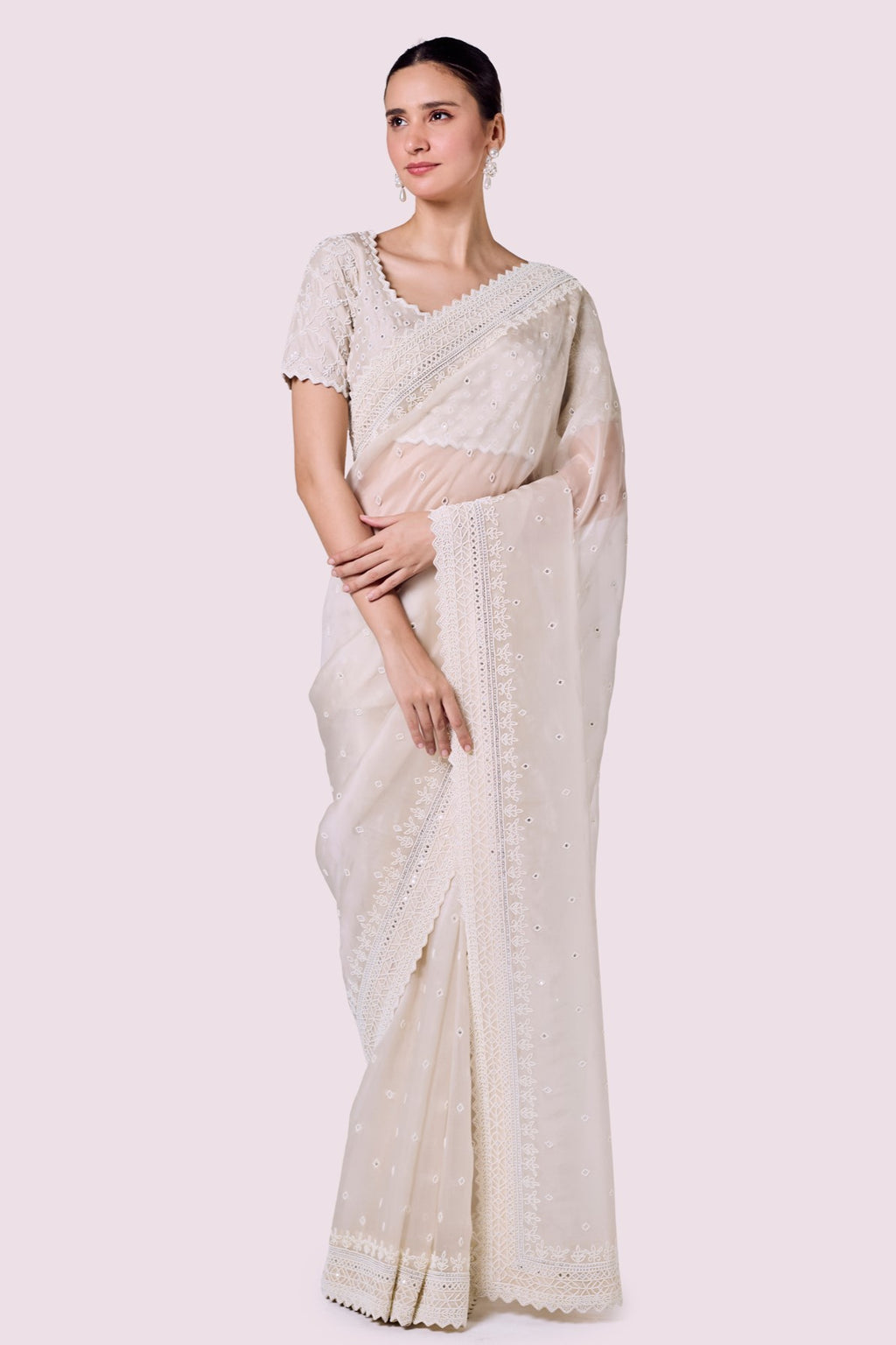 Buy ivory embroidered organza saree online in USA with blouse. Look your best at parties and weddings in beautiful designer sarees, embroidered sarees, handwoven sarees, silk sarees, organza saris from Pure Elegance Indian saree store in USA.-full view