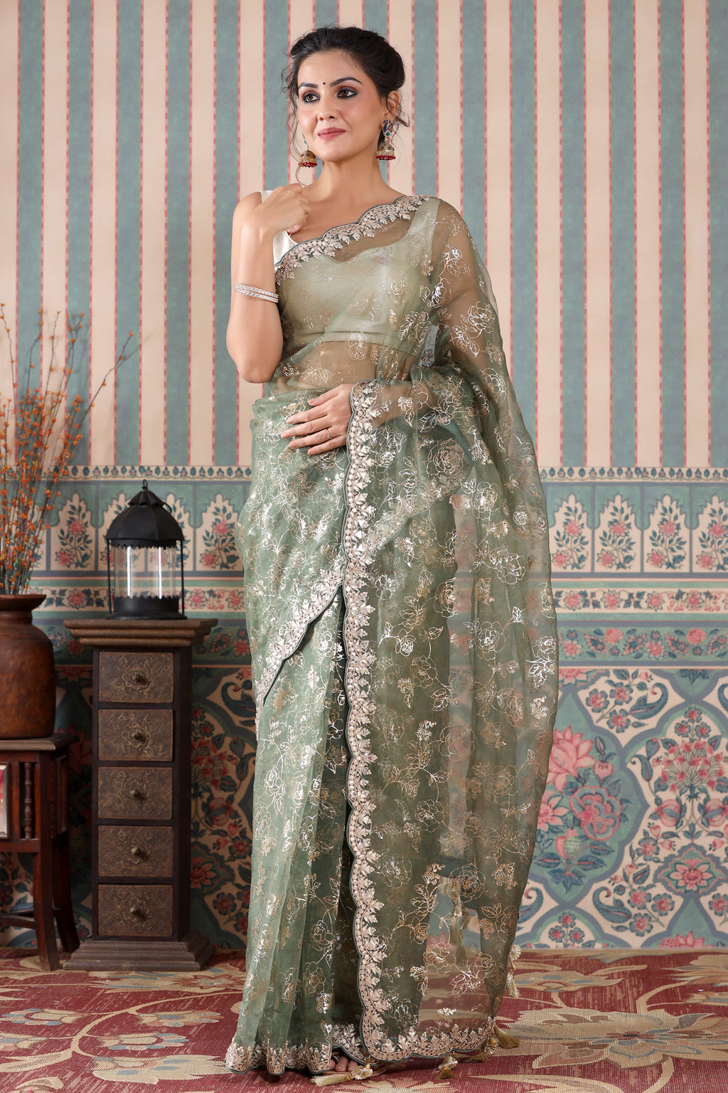 Shop stunning green embroidered organza saree online in USA. Make a fashion statement at weddings with stunning designer sarees, embroidered sarees with blouse, wedding sarees, handloom sarees from Pure Elegance Indian fashion store in USA.-full view