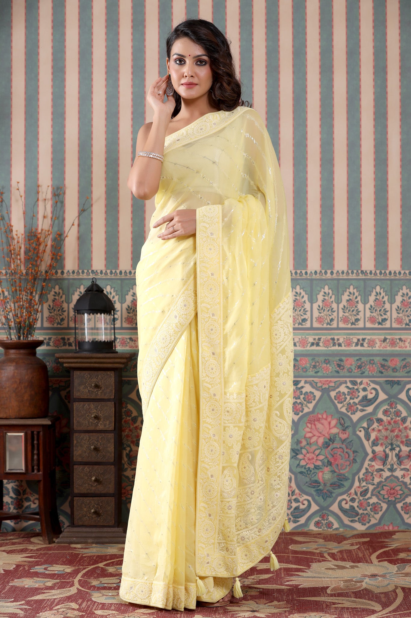 Buy lemon yellow embroidered georgette saree online in USA. Make a fashion statement at weddings with stunning designer sarees, embroidered sarees with blouse, wedding sarees, handloom sarees from Pure Elegance Indian fashion store in USA.-full view