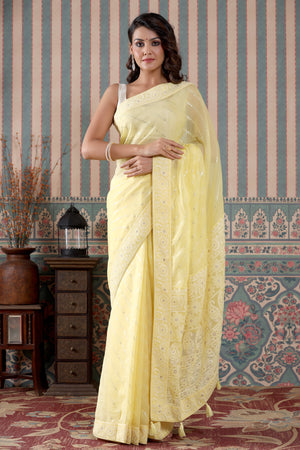 Buy lemon yellow embroidered georgette saree online in USA. Make a fashion statement at weddings with stunning designer sarees, embroidered sarees with blouse, wedding sarees, handloom sarees from Pure Elegance Indian fashion store in USA.-front