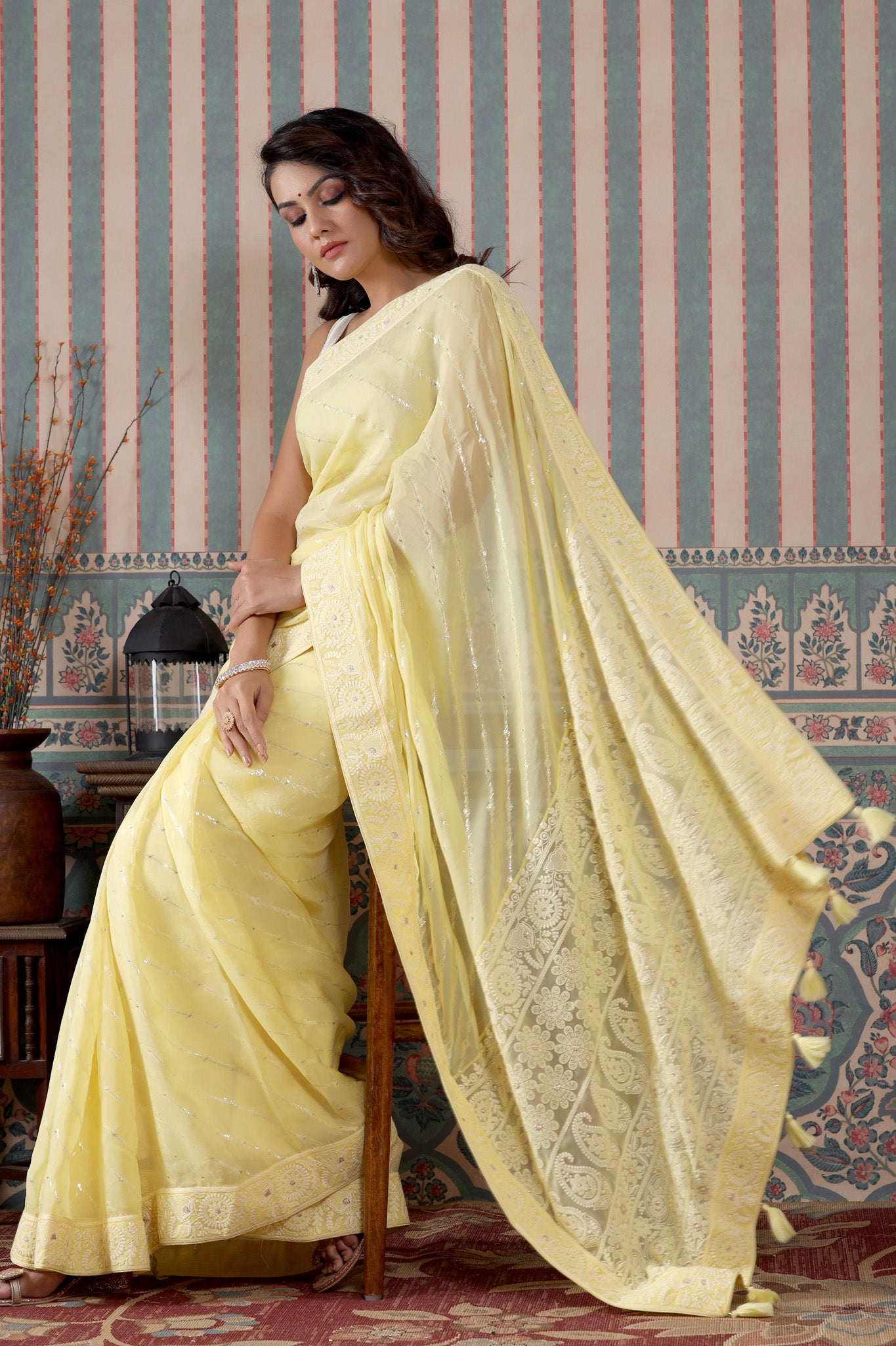 Buy lemon yellow embroidered georgette saree online in USA. Make a fashion statement at weddings with stunning designer sarees, embroidered sarees with blouse, wedding sarees, handloom sarees from Pure Elegance Indian fashion store in USA.-pallu
