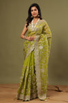 Buy beautiful olive green organza saree online in USA with embroidery. Make a fashion statement at weddings with stunning designer sarees, embroidered sarees with blouse, wedding sarees, handloom sarees from Pure Elegance Indian fashion store in USA.-full view