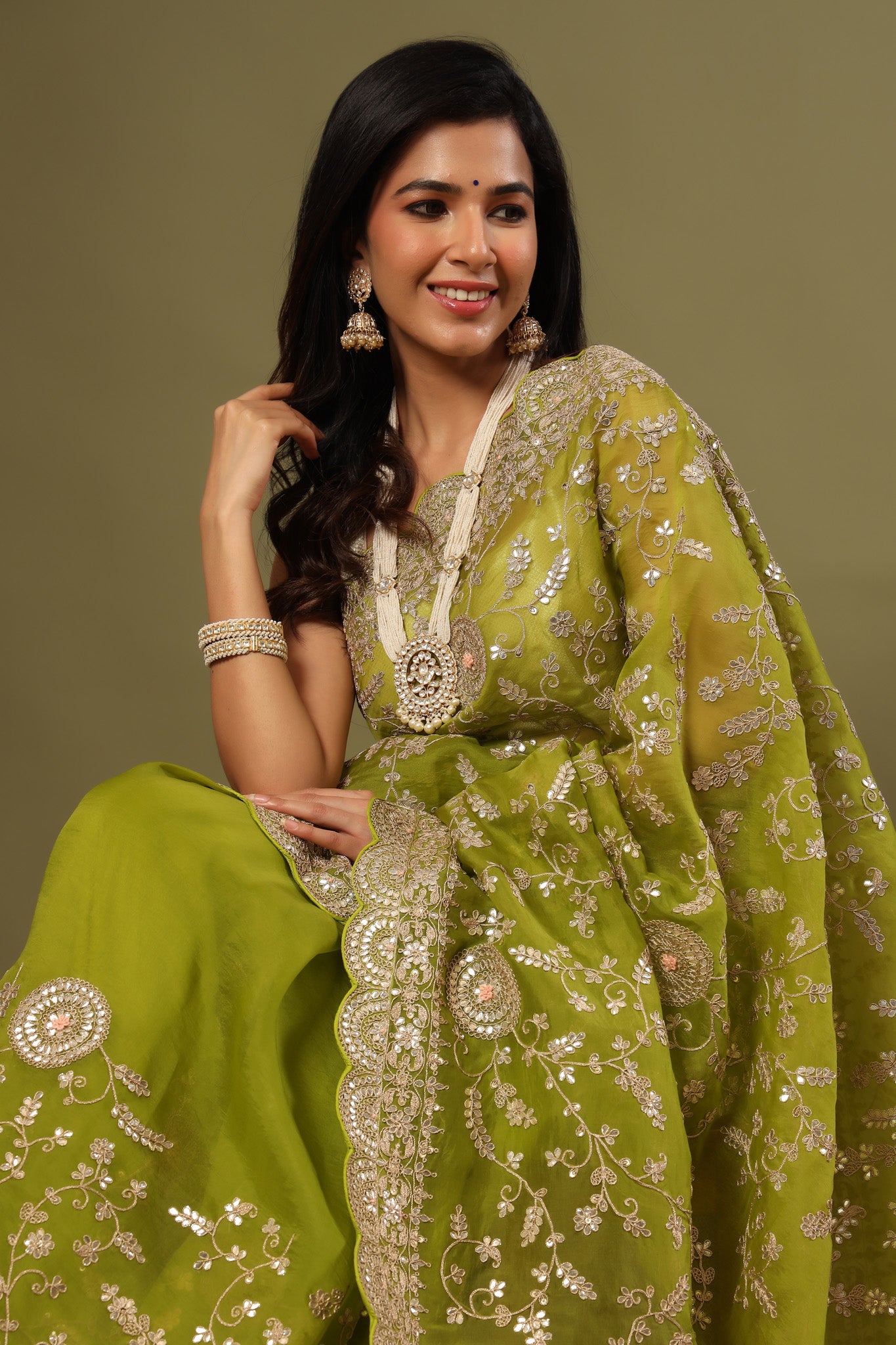 Buy beautiful olive green organza saree online in USA with embroidery. Make a fashion statement at weddings with stunning designer sarees, embroidered sarees with blouse, wedding sarees, handloom sarees from Pure Elegance Indian fashion store in USA.-pallu