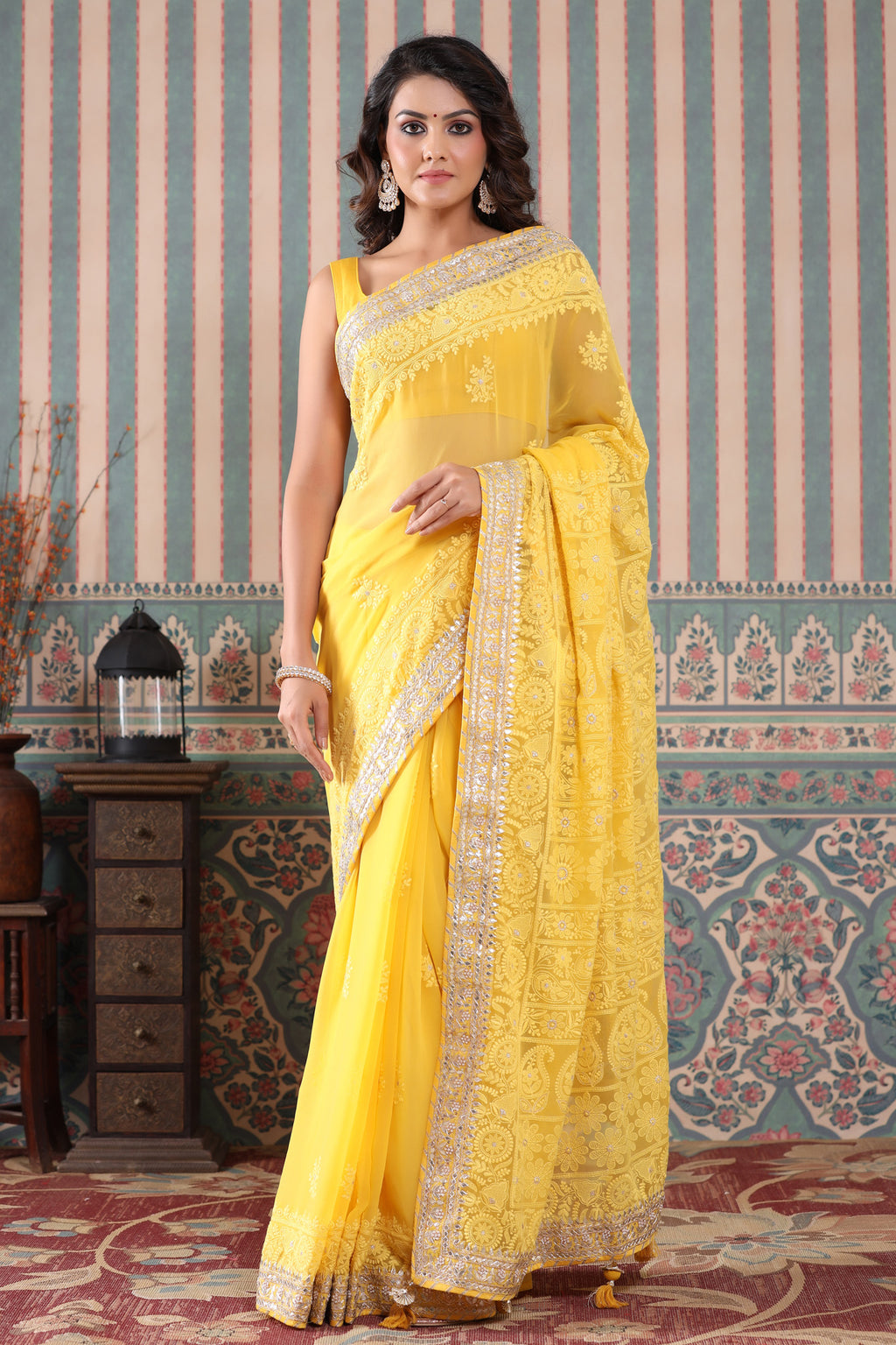 Buy yellow georgette Lucknowi sari online in USA with gota work border. Make a fashion statement at weddings with stunning designer sarees, embroidered sarees with blouse, wedding sarees, handloom sarees from Pure Elegance Indian fashion store in USA.-full view