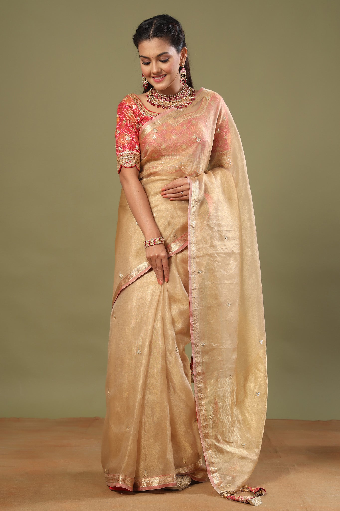 Buy golden tissue silk sari online in USA with pink embroidered blouse. Make a fashion statement at weddings with stunning designer sarees, embroidered sarees with blouse, wedding sarees, handloom sarees from Pure Elegance Indian fashion store in USA.-front