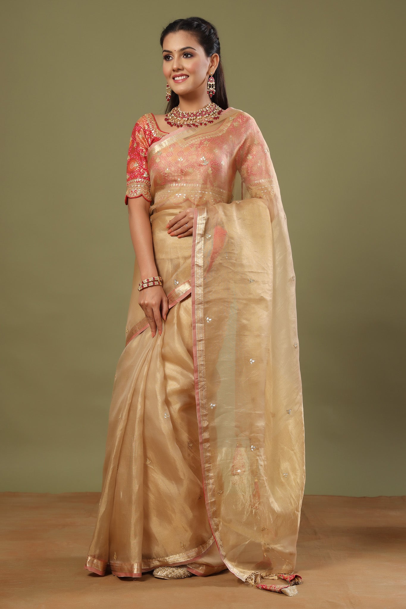 Buy golden tissue silk sari online in USA with pink embroidered blouse. Make a fashion statement at weddings with stunning designer sarees, embroidered sarees with blouse, wedding sarees, handloom sarees from Pure Elegance Indian fashion store in USA.-pallu
