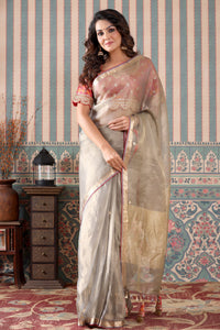 Buy grey tissue silk saree online in USA with pink embroidered blouse. Make a fashion statement at weddings with stunning designer sarees, embroidered sarees with blouse, wedding sarees, handloom sarees from Pure Elegance Indian fashion store in USA.-full view