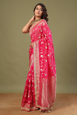 Shop bright pink Banarasi sari online in USA with embroidered border. Make a fashion statement at weddings with stunning designer sarees, embroidered sarees with blouse, wedding sarees, handloom sarees from Pure Elegance Indian fashion store in USA.-pallu