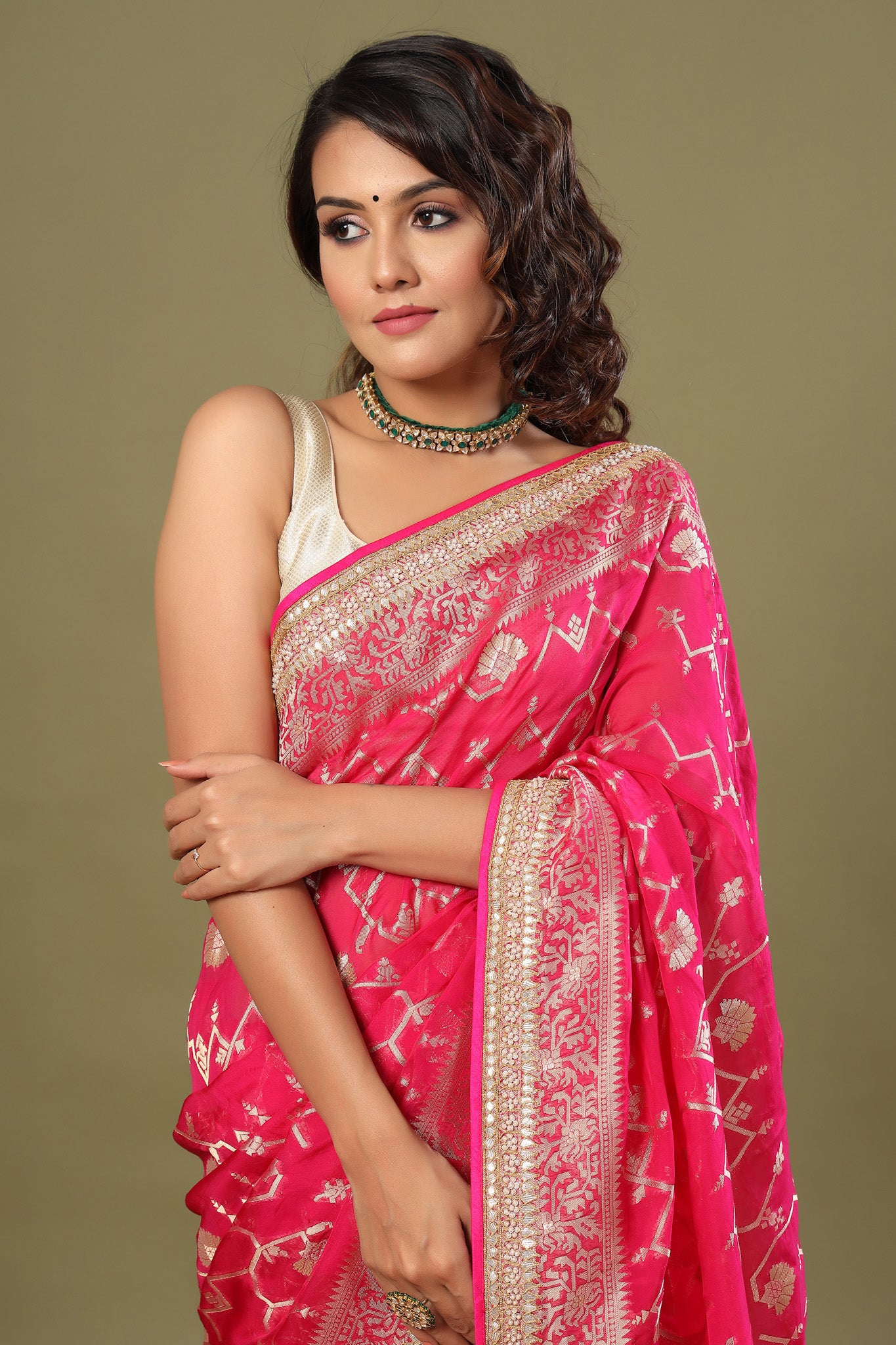 Shop bright pink Banarasi sari online in USA with embroidered border. Make a fashion statement at weddings with stunning designer sarees, embroidered sarees with blouse, wedding sarees, handloom sarees from Pure Elegance Indian fashion store in USA.-closeup