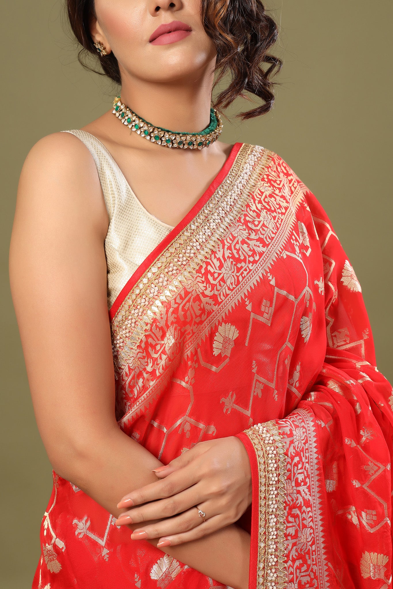 Buy bright red Banarasi saree online in USA with embroidered border. Make a fashion statement at weddings with stunning designer sarees, embroidered sarees with blouse, wedding sarees, handloom sarees from Pure Elegance Indian fashion store in USA.-closeup