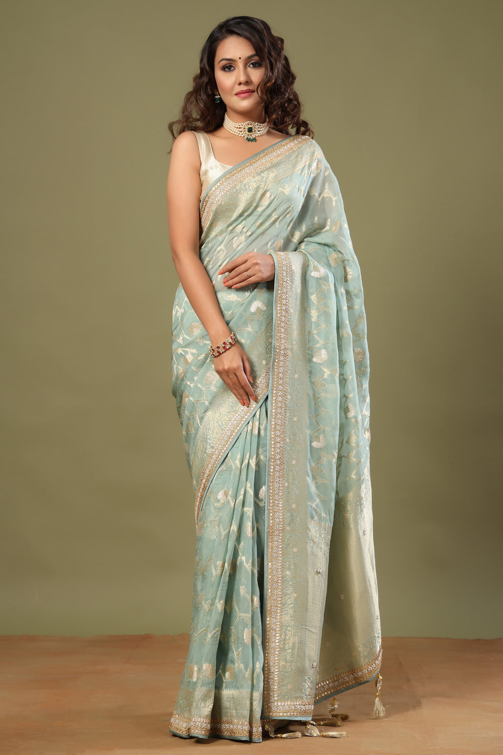 Shop mint green Banarasi saree online in USA with embroidered border. Make a fashion statement at weddings with stunning designer sarees, embroidered sarees with blouse, wedding sarees, handloom sarees from Pure Elegance Indian fashion store in USA.-full view