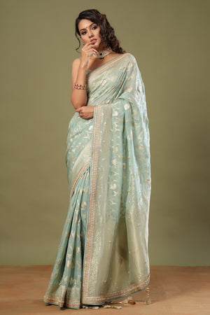 Shop mint green Banarasi saree online in USA with embroidered border. Make a fashion statement at weddings with stunning designer sarees, embroidered sarees with blouse, wedding sarees, handloom sarees from Pure Elegance Indian fashion store in USA.-pallu