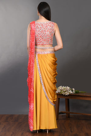 Shop mustard and red drape saree with embroidered blouse and belt. Make a fashion statement on festive occasions and weddings with designer sarees, designer suits, Indian dresses, Anarkali suits, palazzo suits, designer gowns, sharara suits, and embroidered sarees from Pure Elegance Indian fashion store in the USA.