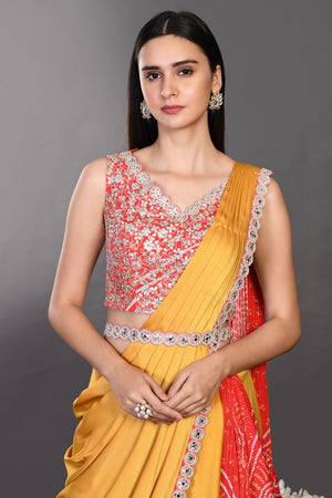 Shop mustard and red drape saree with embroidered blouse and belt. Make a fashion statement on festive occasions and weddings with designer sarees, designer suits, Indian dresses, Anarkali suits, palazzo suits, designer gowns, sharara suits, and embroidered sarees from Pure Elegance Indian fashion store in the USA.