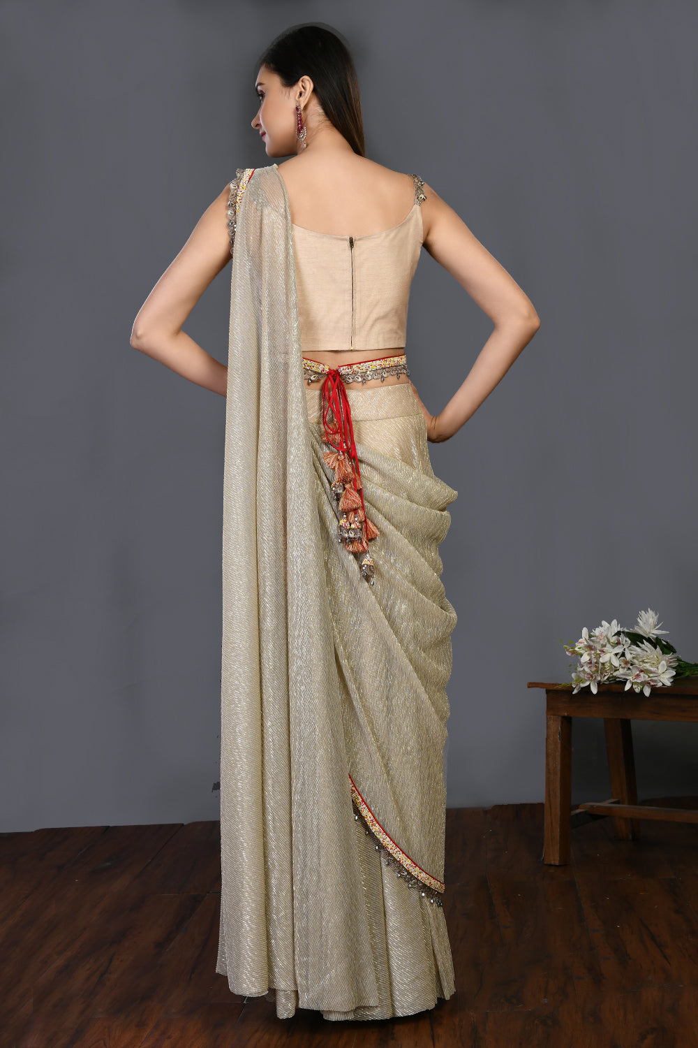 Buy this beige silk stone drape saree set. Make a fashion statement on festive occasions and weddings with designer sarees, designer suits, Indian dresses, Anarkali suits, palazzo suits, designer gowns, sharara suits, and embroidered sarees from Pure Elegance Indian fashion store in the USA.