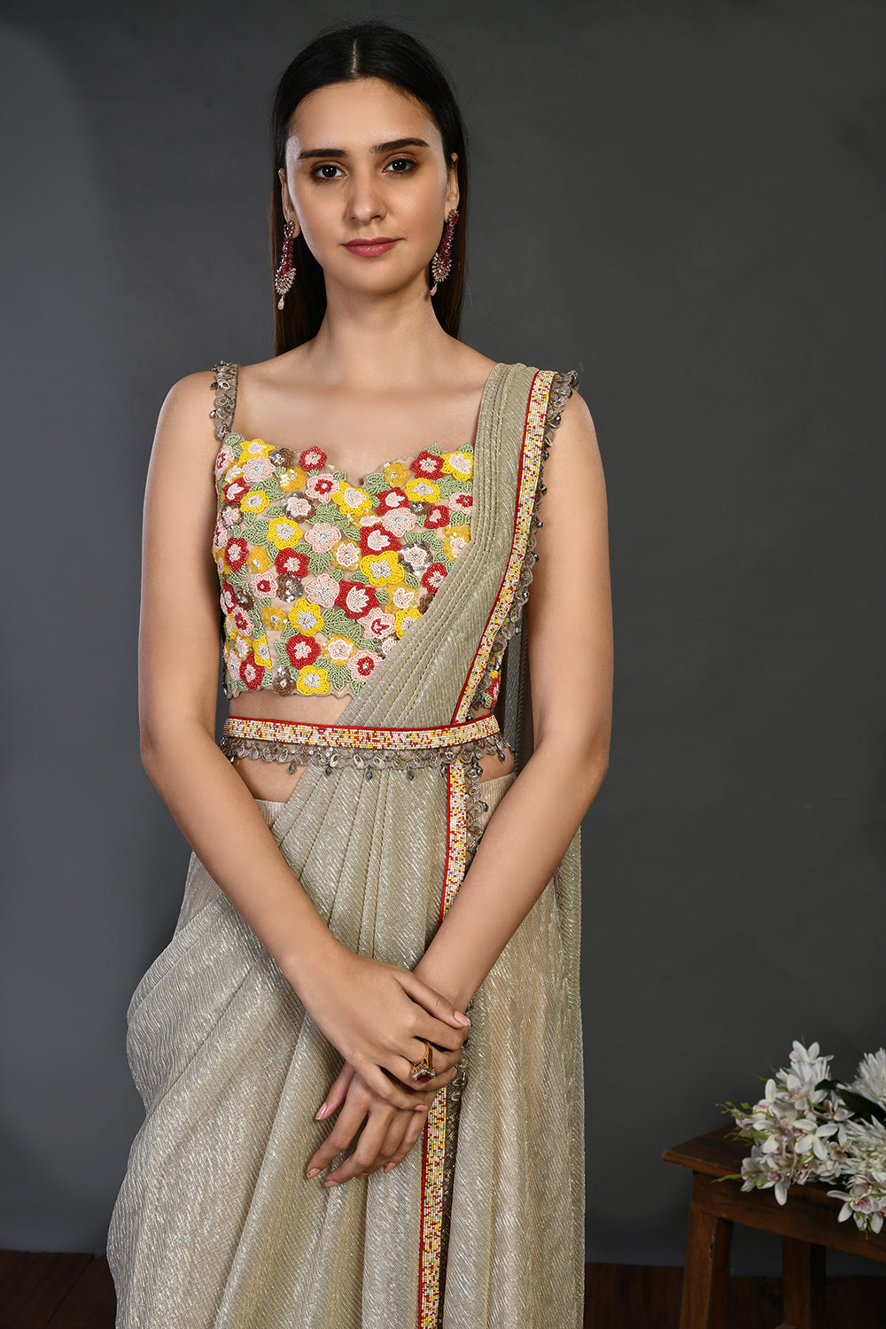 Buy this beige silk stone drape saree set. Make a fashion statement on festive occasions and weddings with designer sarees, designer suits, Indian dresses, Anarkali suits, palazzo suits, designer gowns, sharara suits, and embroidered sarees from Pure Elegance Indian fashion store in the USA.