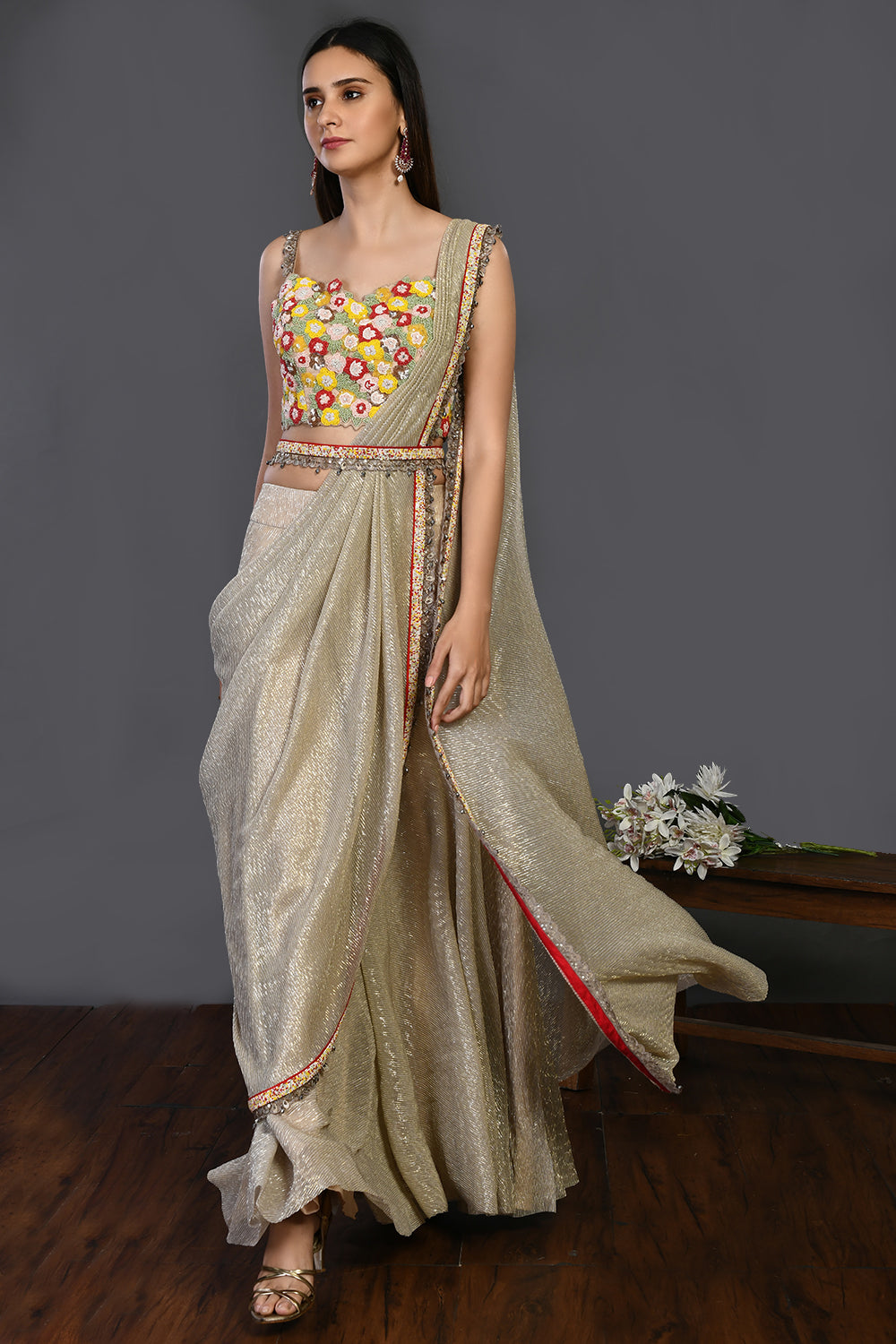 Buy this beige silk stone drape saree set. Make a fashion statement on festive occasions and weddings with designer sarees, designer suits, Indian dresses, Anarkali suits, palazzo suits, designer gowns, sharara suits, and embroidered sarees from Pure Elegance Indian fashion store in the USA.