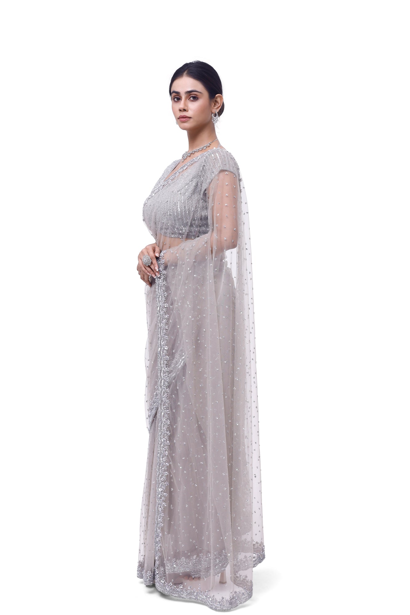 Shop light grey embroidered net saree online in USA with saree blouse. Look your best at parties and weddings in beautiful designer sarees, embroidered sarees, handwoven sarees, silk sarees, organza saris from Pure Elegance Indian saree store in USA.-side