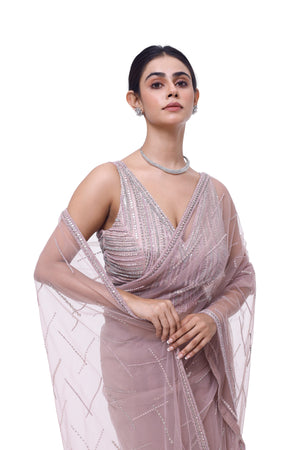 Buy beautiful dusty pink embroidered net saree online in USA with saree blouse. Look your best at parties and weddings in beautiful designer sarees, embroidered sarees, handwoven sarees, silk sarees, organza saris from Pure Elegance Indian saree store in USA.-closeup